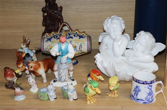 A Copeland Spode model of Cherubs, mixed ceramics and a Chinese carved figure height 21cm